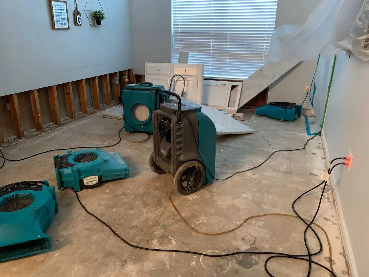 Dehumidifier in flood-cut room for Water Damage Restoration in Brookhaven